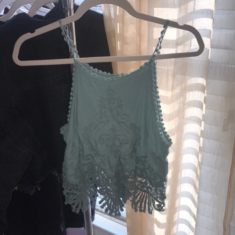 Blue embellished crop top from Pacsun.